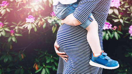 Putin names desired minimum fertility rate for Russia