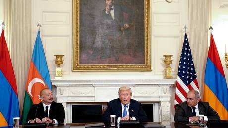 US President Donald Trump (C), Azerbaijani President Ilham Aliyev (L), and Armenian Prime Minister Nikol Pashinyan (R) in Washington, DC. August 8, 2025.