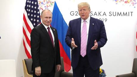 FILE PHOTO: Russian President Vladimir Putin and US President Donald Trump.