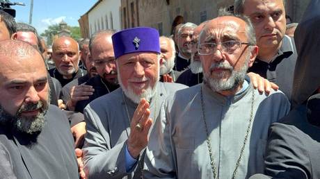 FILE PHOTO: Catholicos of All Armenians Karekin II and Archbishop Mikael Ajapahyan, head of the Shirak Diocese of the Armenian Apostolic Church, are seen at the Mother See of Holy Etchmiadzin, in Armenia.