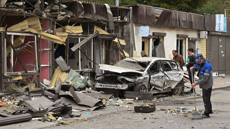 FILE PHOTO: Market stalls and a car damaged in a reported Ukrainian drone attack in Bataysk, Rostov region, Russia.