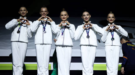 The team of Russia stands during the award ceremony at the FIG Rhythmic Gymnastics World Cup, AGF Trophy in Baku, Azerbaijan, April 19, 2026.