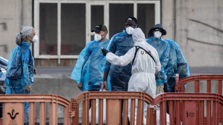 Medical staff evacuate passengers from the MV Hondius in Tenerife, Spain, May 11, 2026