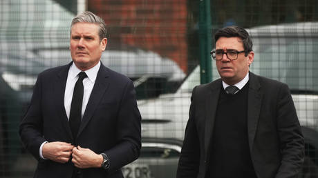 FILE PHOTO. Sir Keir Starmer (L) and Andy Burnham (R).