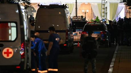 Medical staff members gather near the site of an explosion outside a restaurant in central Moscow, Russia, August 1, 2026